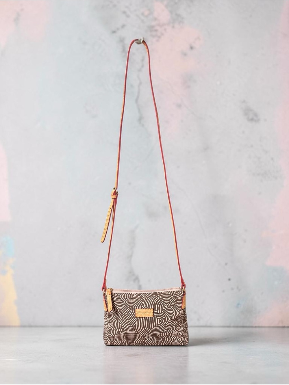 Dooney & Bourke Cream and Brown Doodle Swirl Crossbody Bag